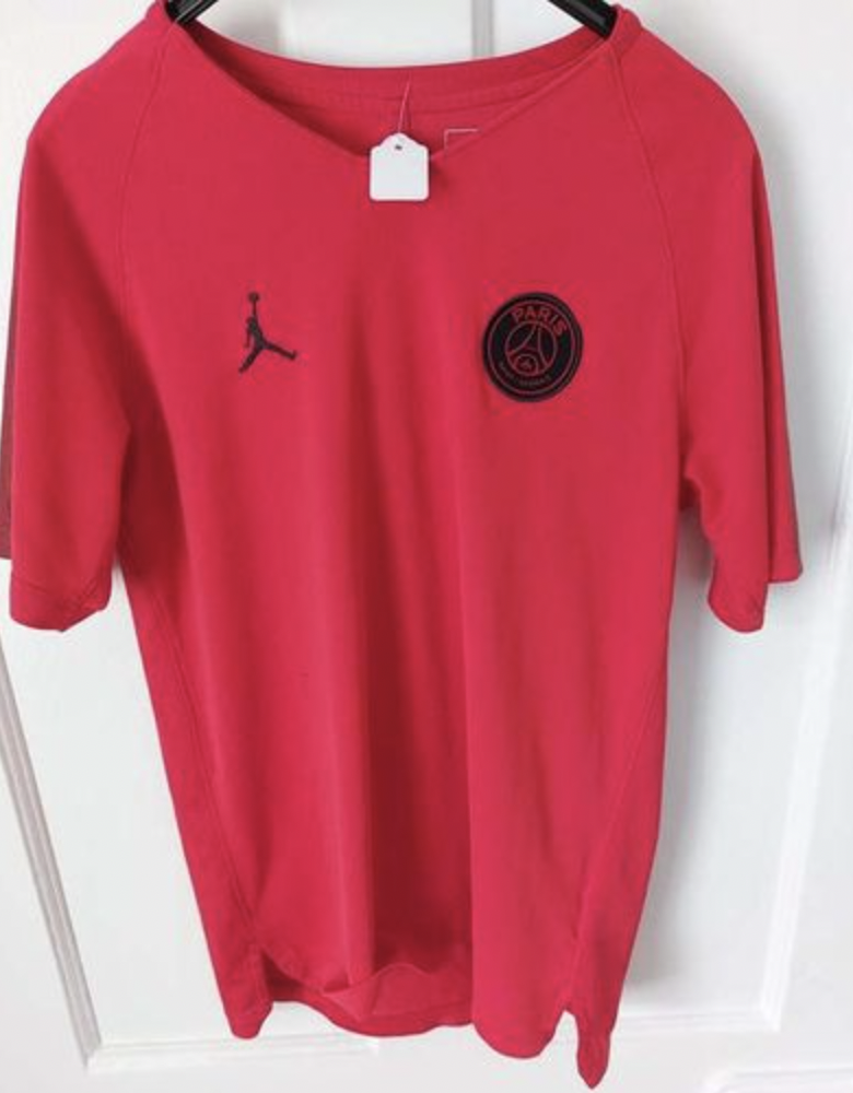 Pink PSG Jordan football shirt hunting charity shops